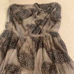 Silver romper worn once no flaws